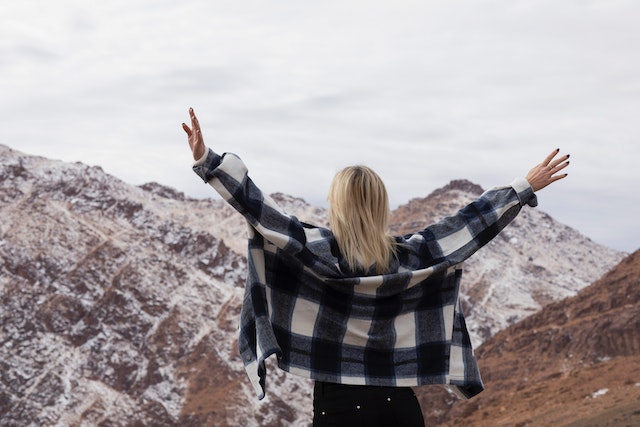 Woman with hands up